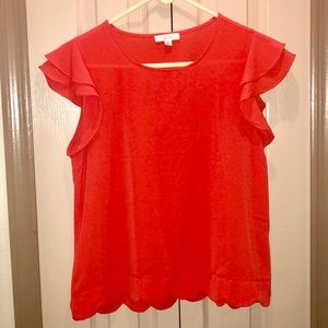Orange shell-bottom tee